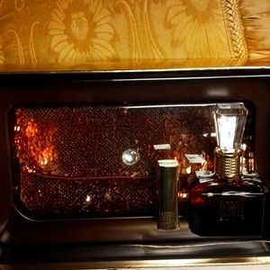 Norell gift set perfume, lipstick, purse